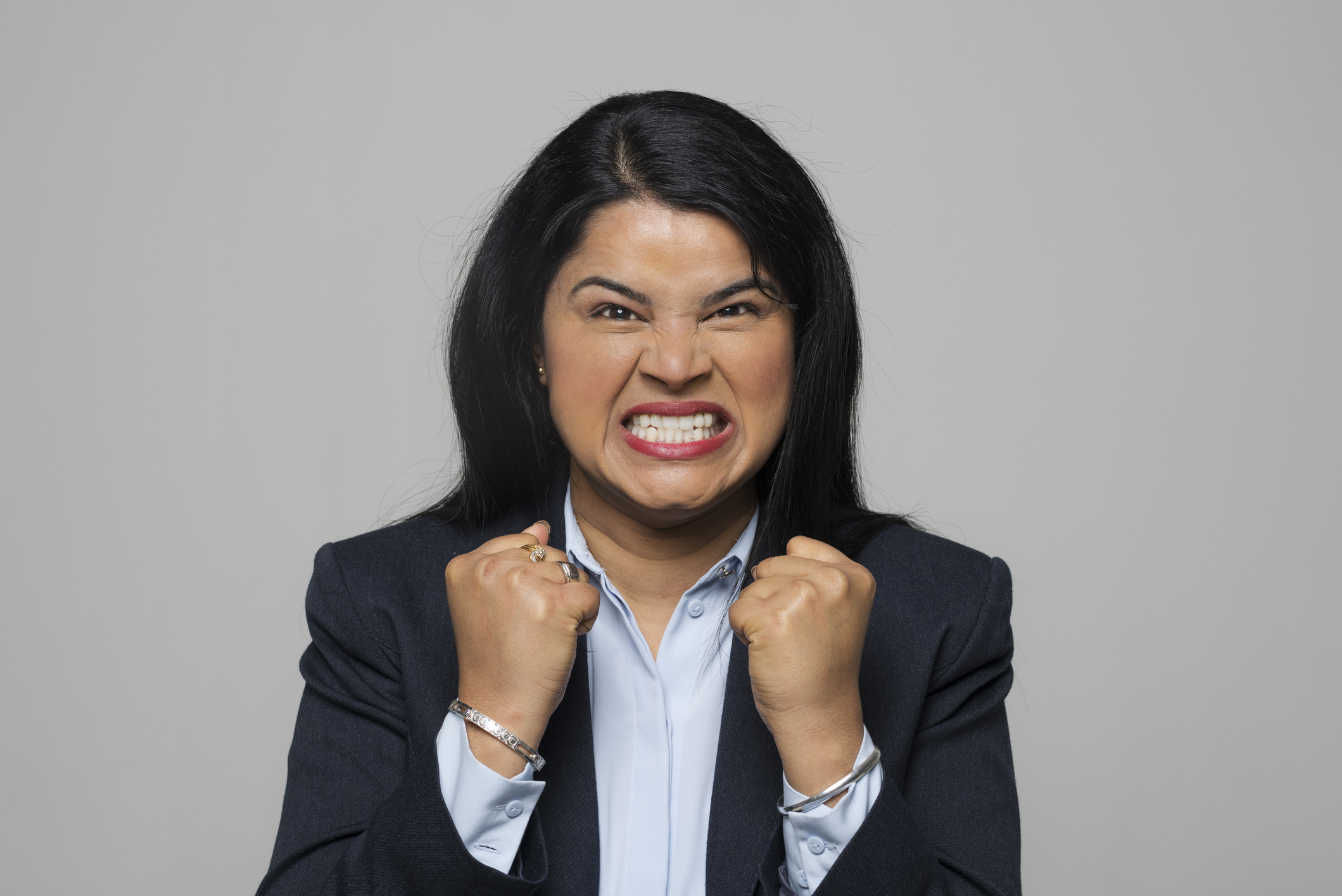 woman clenching her teeth